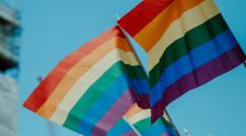 Four Pride Flags being flown