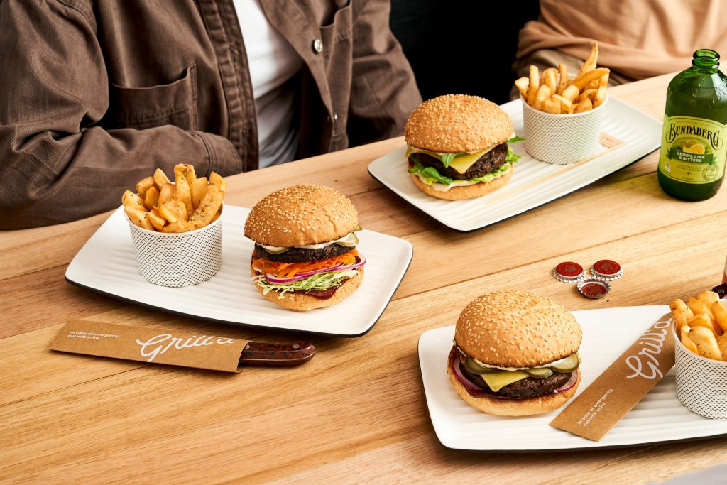 three Fable burgers on a table